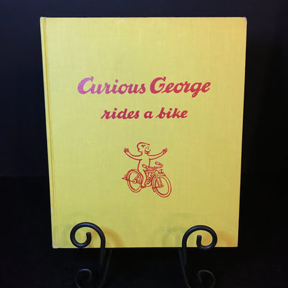 Curious George Rides A Bike - H.A. Rey - 9th Print - Later Reprint - 1966