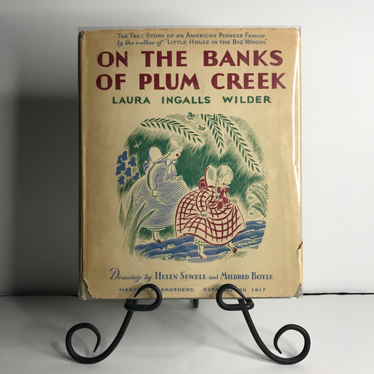 On the Banks of Plum Creek - Laura Ingalls Wilder - 13th Edition w Dust Jacket